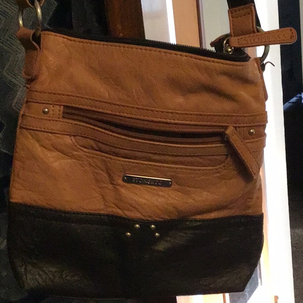 Brown and black leather purse